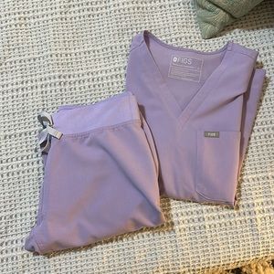Light Purple Figs. XS Livingston pants, S one pocket scrub top.